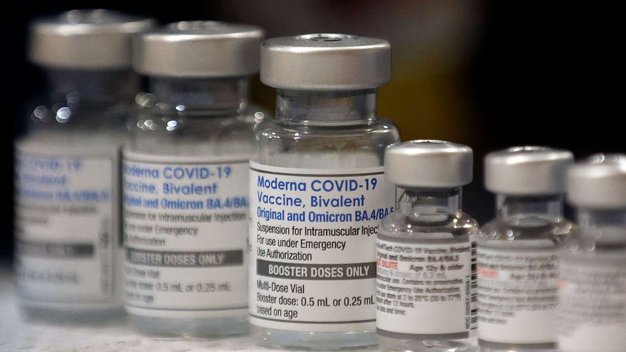 Vials of the Moderna and Pfizer COVID-19 bivalent booster at the Sanderson Community Center in Taylorsville on Nov. 9, 2022. The federal government's effort to simplify COVID-19 shots is one step closer.