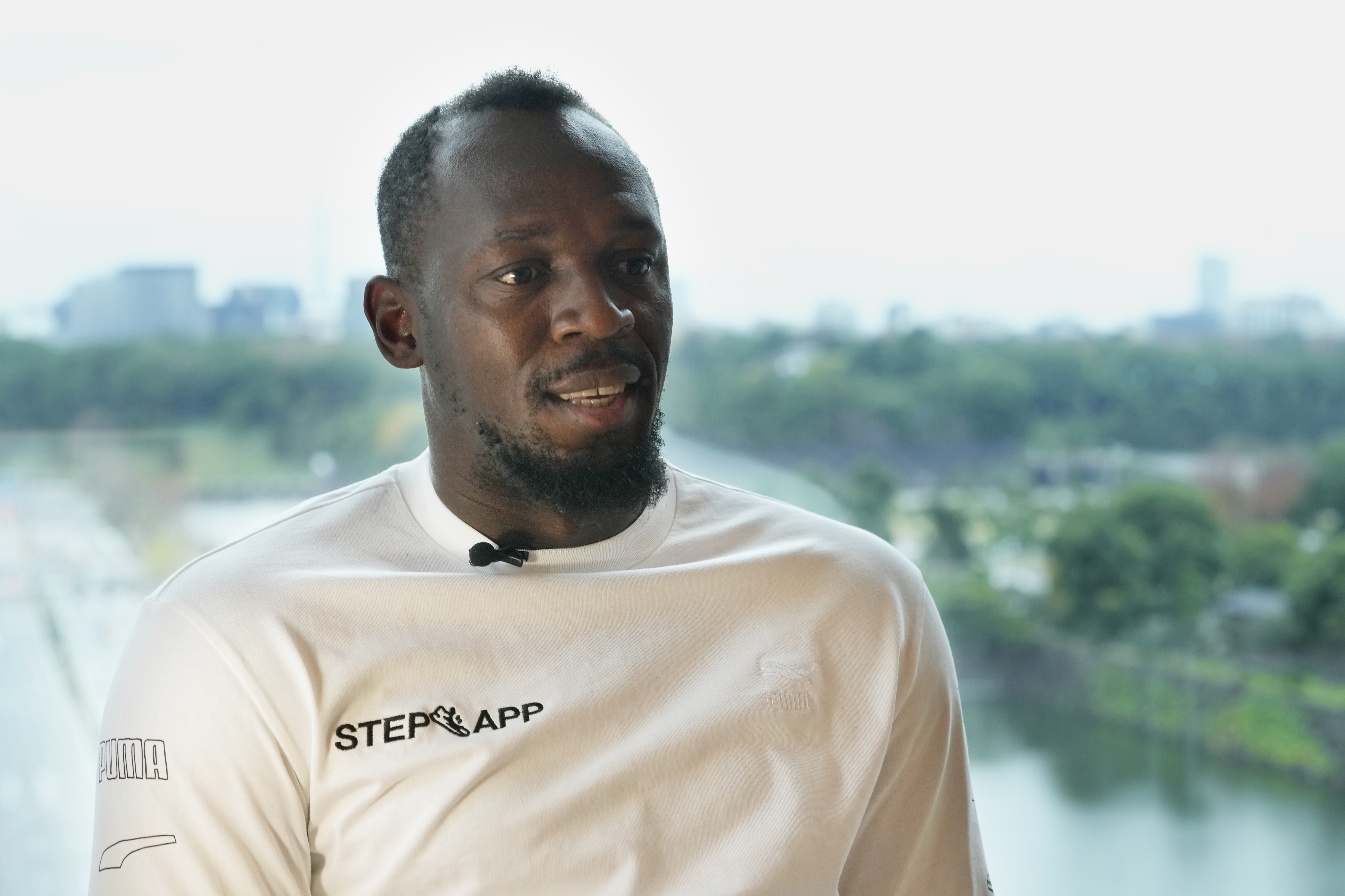 FILE - Retired Jamaican sprinter Usain Bolt speaks during an interview in Tokyo, Thursday, Dec. 1, 2022. Jamaica’s government has turned to the FBI for help as it investigates a massive fraud case involving a private investment firm where $12.7 million belonging to renown sprinter Usain Bolt has gone missing. 