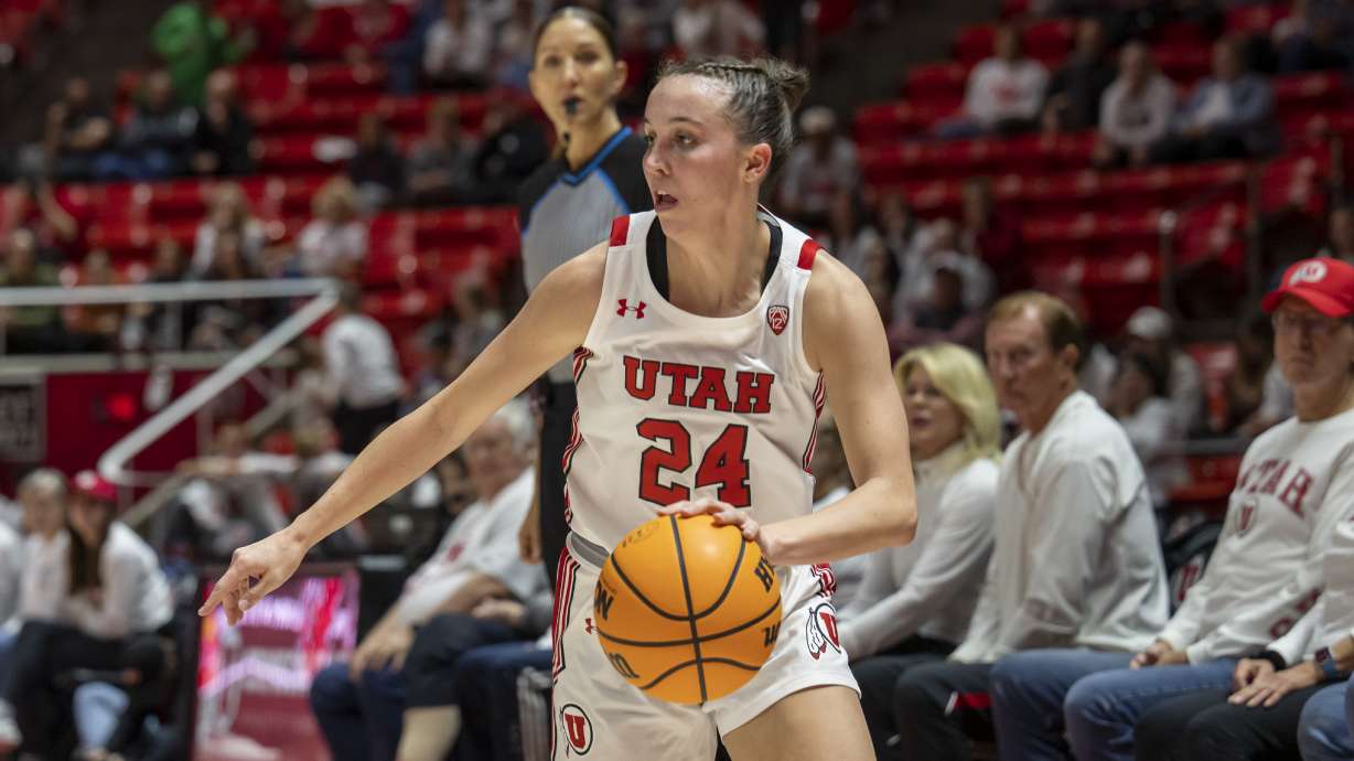 Utah Utes guard Kennady McQueen (24) dribbles on offense during an NCAA basketball game on Wednesday, Nov. 16, 2022, in Salt Lake City, Utah.