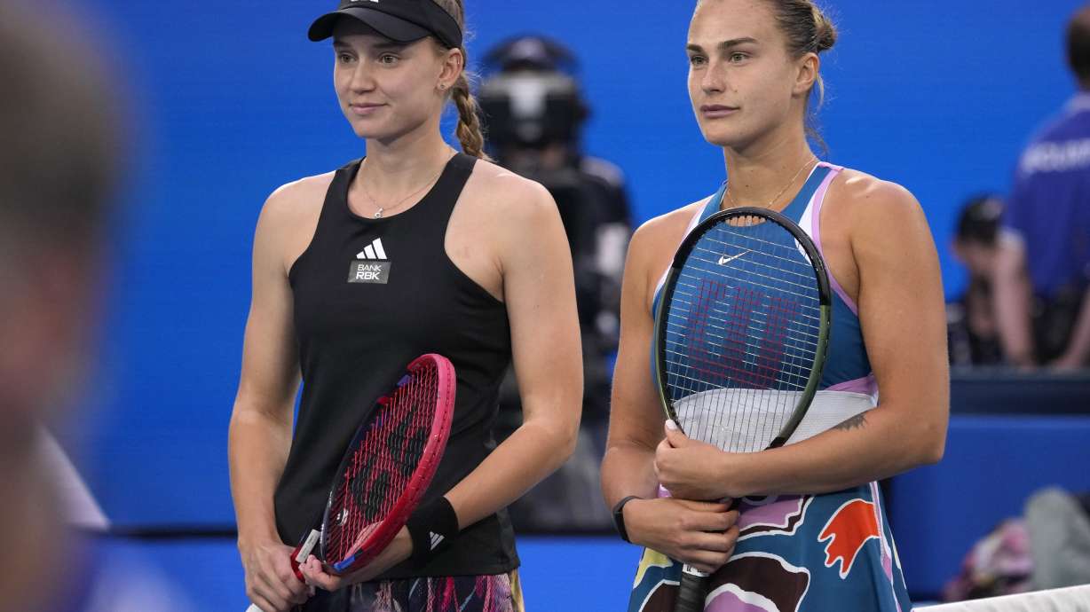 Elena Rybakina, left, of Kazakhstan and Aryna Sabalenka of Belarus pose for a photo ahead of the women's singles final at the Australian Open tennis championship in Melbourne, Australia, Saturday, Jan. 28, 2023.