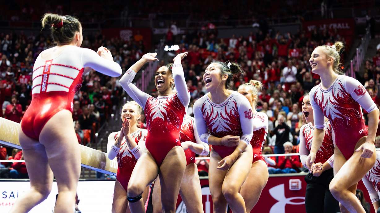 Utah congratulates Maile O’Keefe after her beam routine during an NCAA gymnastics meet at the Huntsman Center in Salt Lake City on Saturday, Jan. 28, 2023.