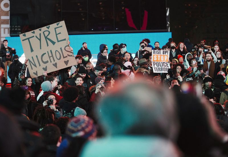 People take part in a protest Saturday following the release of a video showing police officers beating Tyre Nichols, the young Black man who died three days after he was pulled over while driving during a traffic stop by Memphis police officers, in New York.