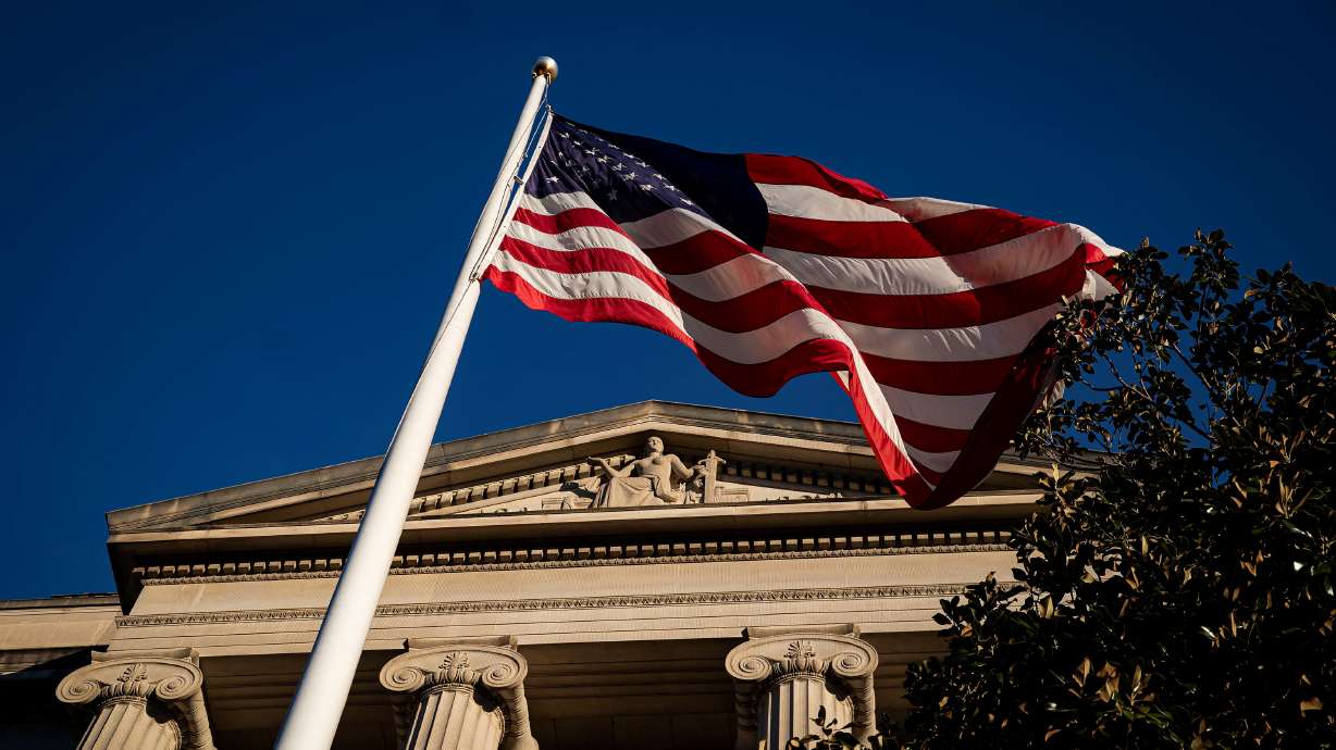 An American flag in Washington on Dec. 15, 2020. Independence Day is also the anniversary of two major conflicts in American history — conflicts that live on to this day.