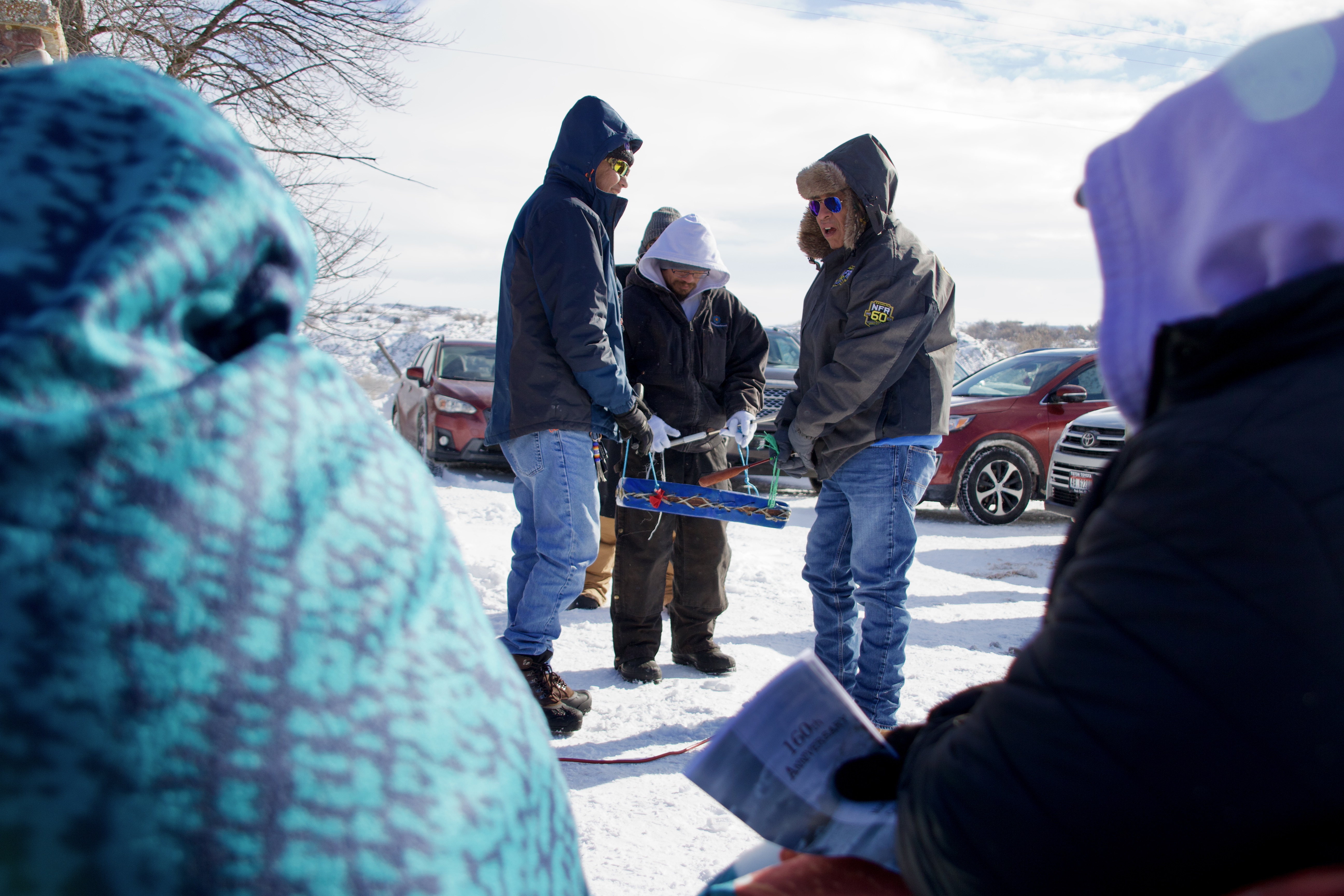 Members of the Northwestern Band of Shoshone Nation play a song for the posting of the colors during a memorial for the 160th anniversary of the Bear River Massacre outside Preston, Idaho, on Sunday.