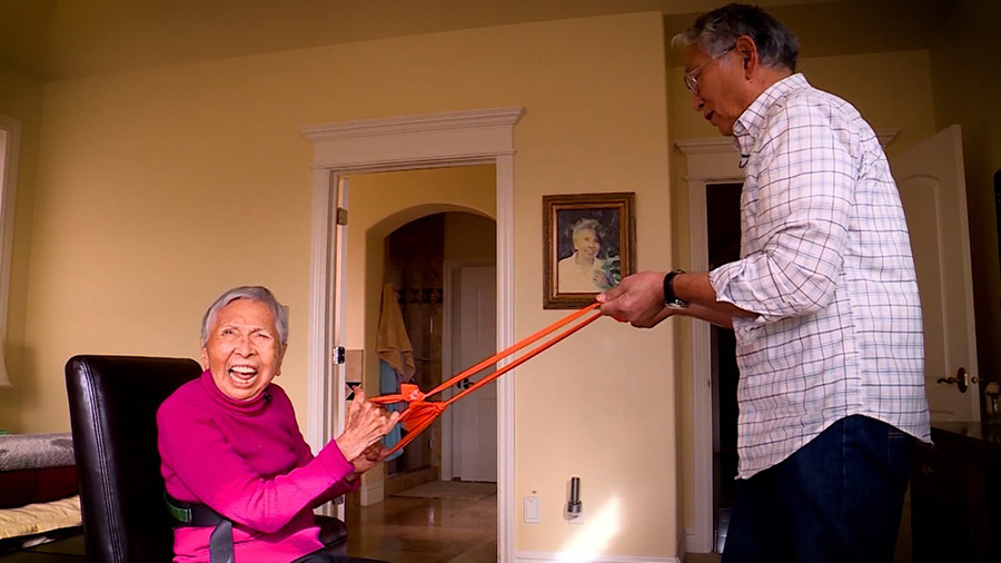 Mary Kawakami and her son Paul working out together in 2019. With over 100 years of life experience, she has some insight to share.