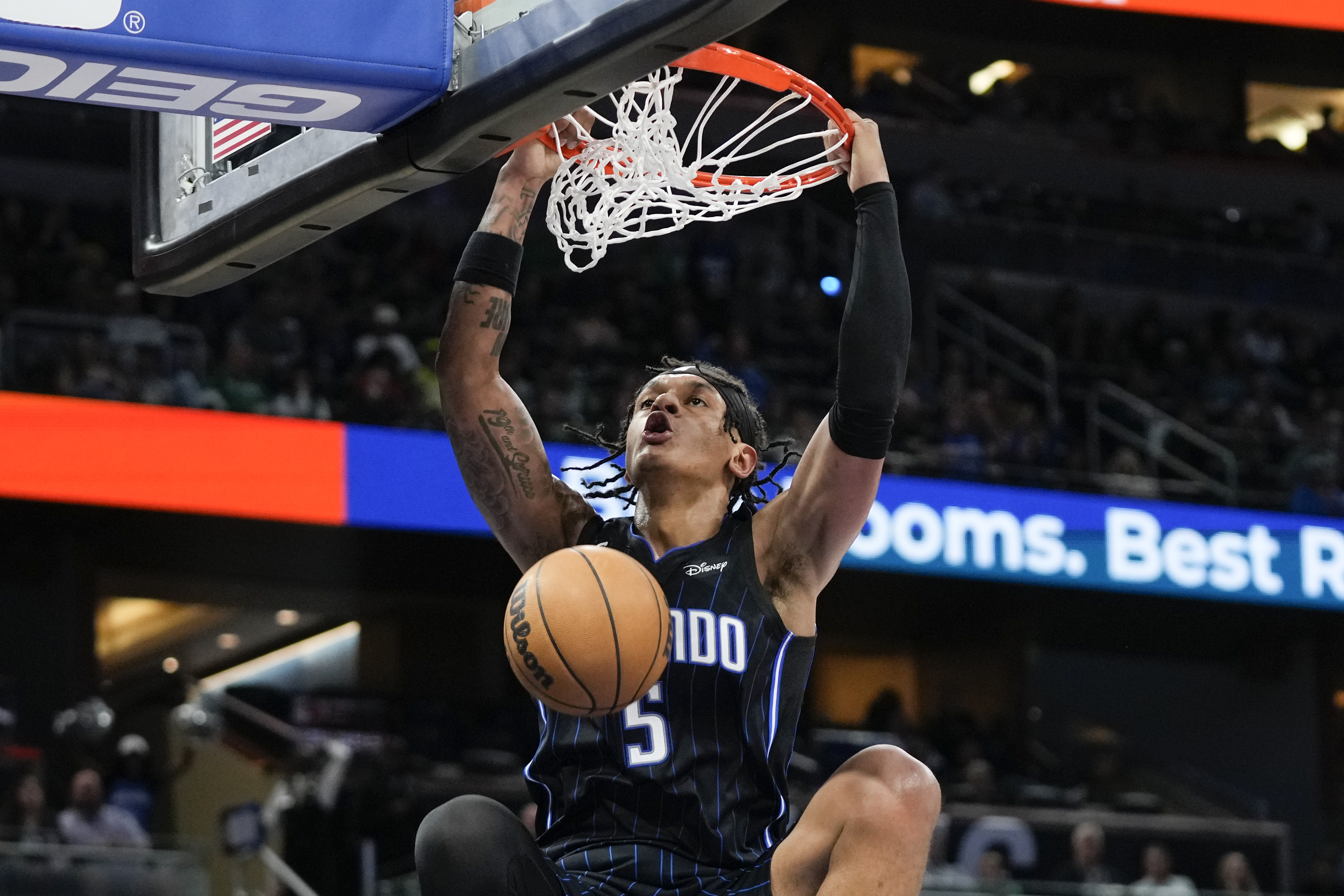 Orlando Magic's Paolo Banchero makes an uncontested dunk against the Boston Celtics during the second half of an NBA basketball game, Monday, Jan. 23, 2023, in Orlando, Fla. 