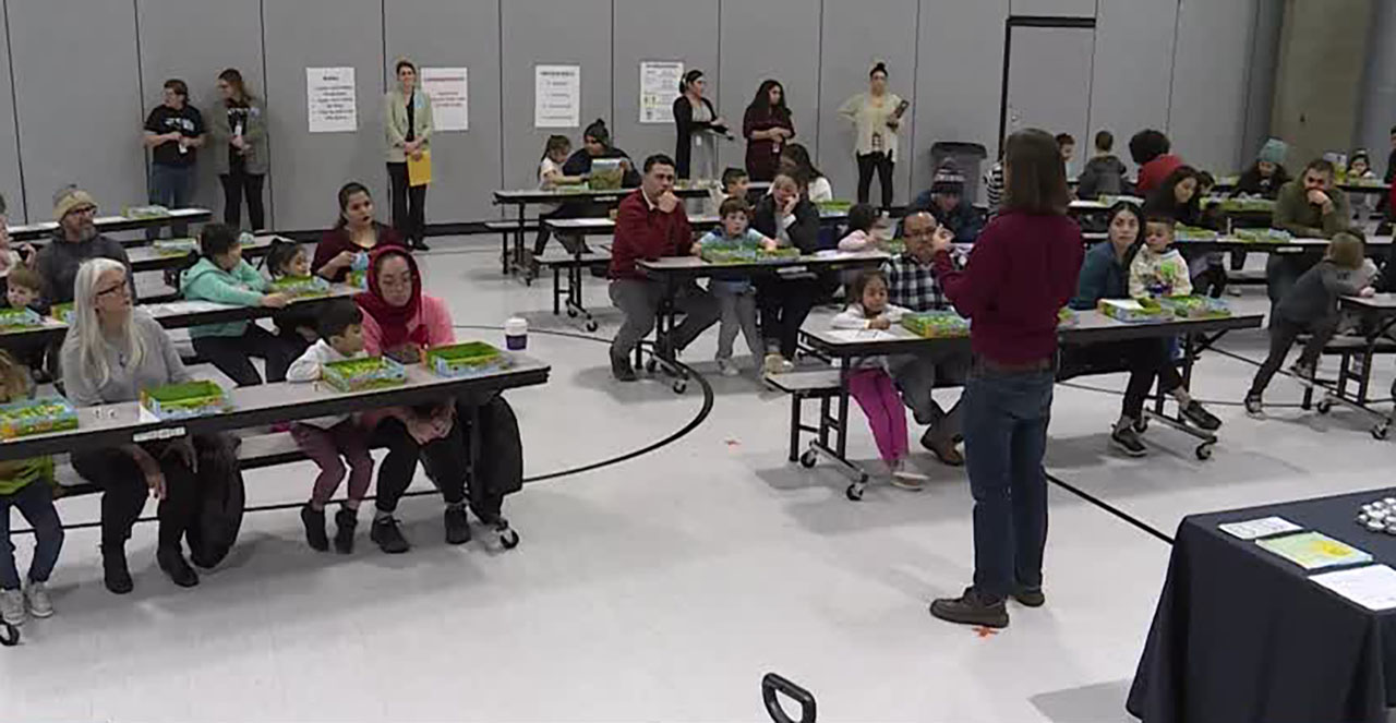 Dozens of parents and their preschoolers pack the gymnasium at Liberty Elementary School in Salt Lake City, Friday, for an event put on by the Utah STEM Action Center.