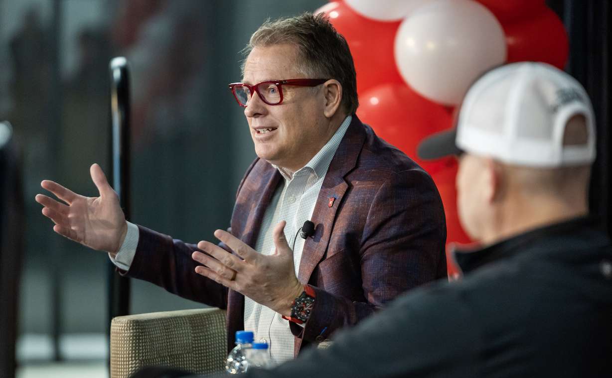University of Utah President Taylor Randall talks with Stena Foundation founder Steve Smith, right, about the newly announced Stena Center for Financial Technology at a press conference at Rice-Eccles Stadium in Salt Lake City on Monday.