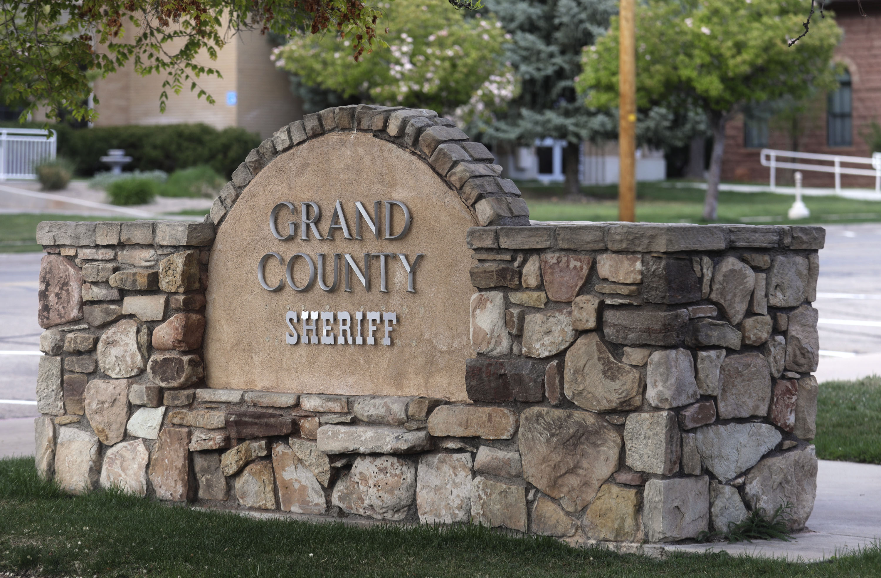 A corrections officer with the Grand County Sheriff's Office was charged Monday after allegedly taking an inappropriate photo of an inmate and sharing it with a co-worker. 