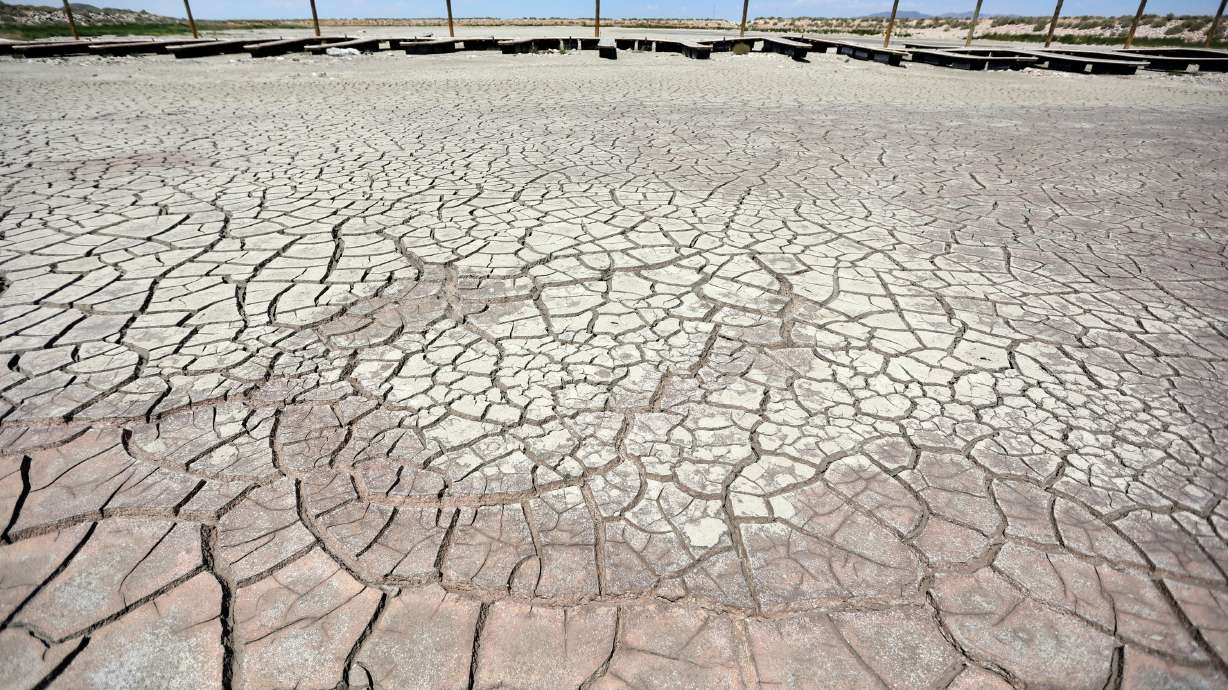 The Antelope Island marina is dried up as the Great Salt Lake experiences record low water levels on July 22, 2022. Utah's lawmakers and advocates who are witnessing the effects of a historic drought on the lake say action must be taken to rectify the past.