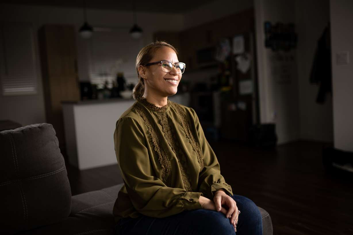 Kahea Benitez-Kauo poses for a photo at her home in Draper on Jan. 6. She has been battling both breast and thyroid cancer.
