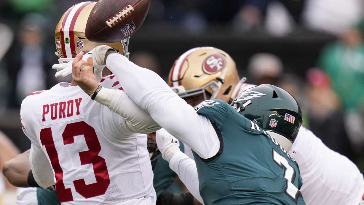 Philadelphia Eagles linebacker Haason Reddick, right, causes a fumble by San Francisco 49ers quarterback Brock Purdy during the first half of the NFC Championship NFL football game between the Philadelphia Eagles and the San Francisco 49ers on Sunday, Jan. 29, 2023, in Philadelphia.