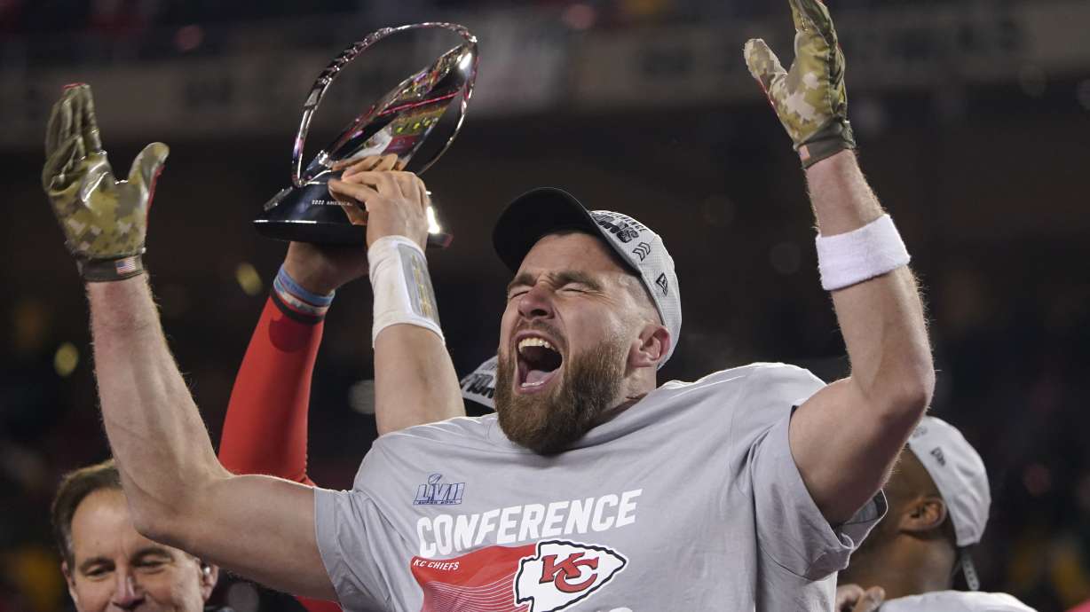 Kansas City Chiefs tight end Travis Kelce celebrates after the NFL AFC Championship playoff football game against the Cincinnati Bengals, Sunday, Jan. 29, 2023, in Kansas City, Mo. The Chiefs won 23-20.