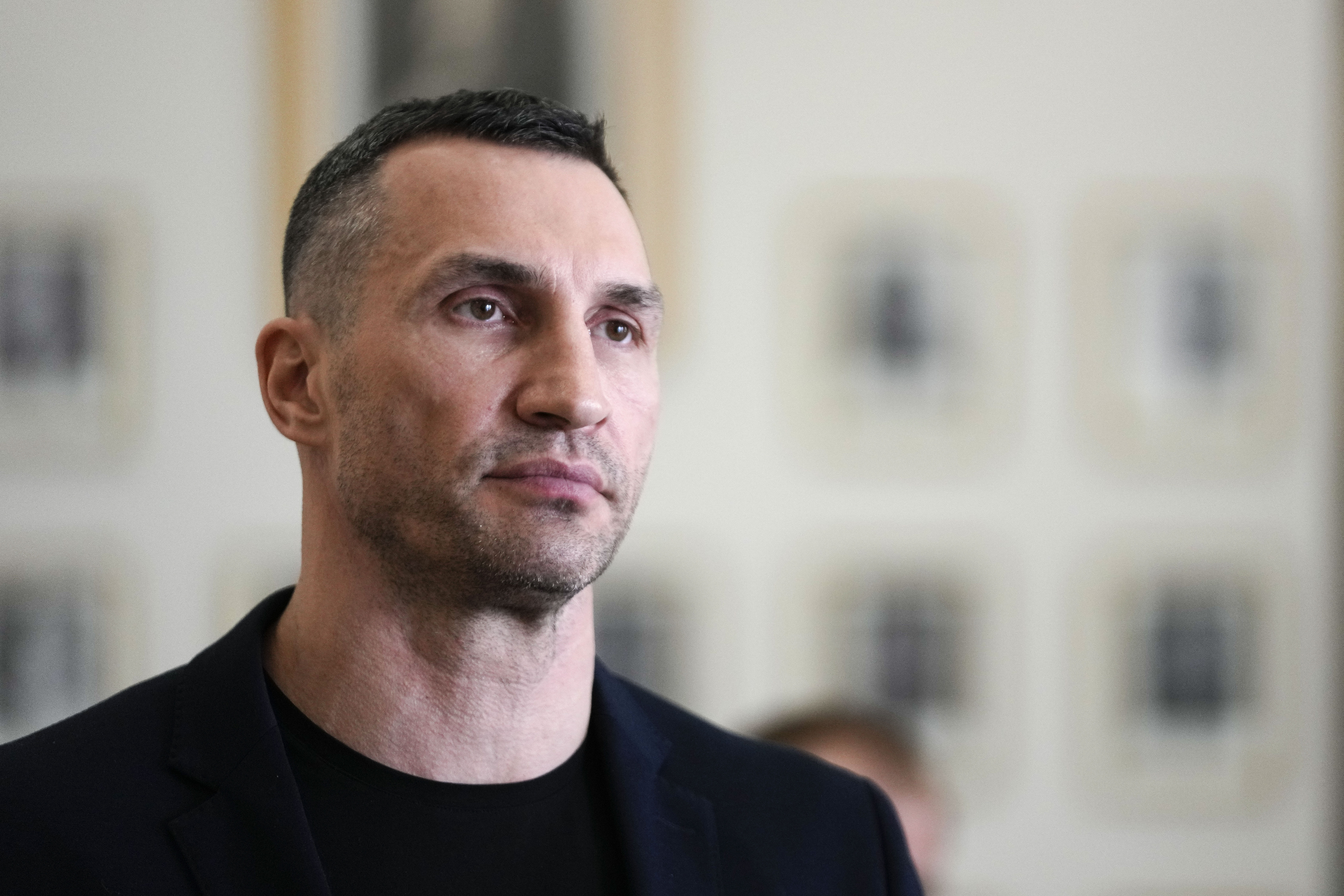 FILE - Former heavyweight boxing world champion Wladimir Klitschko leaves after a meeting with German Economy and Climate Minister Robert Habeck in Berlin, March 31, 2022. Olympic gold medalist Wladimir Klitschko has joined Ukraine’s fight against IOC plans to let some Russians compete at the 2024 Paris Summer Games, it was announced Tuesday, Jan. 31, 2023. The former heavyweight world champion has suggested in a video message sports leaders will be accomplices to the war if athletes from Russia and its military ally Belarus can compete at the next Olympics. 