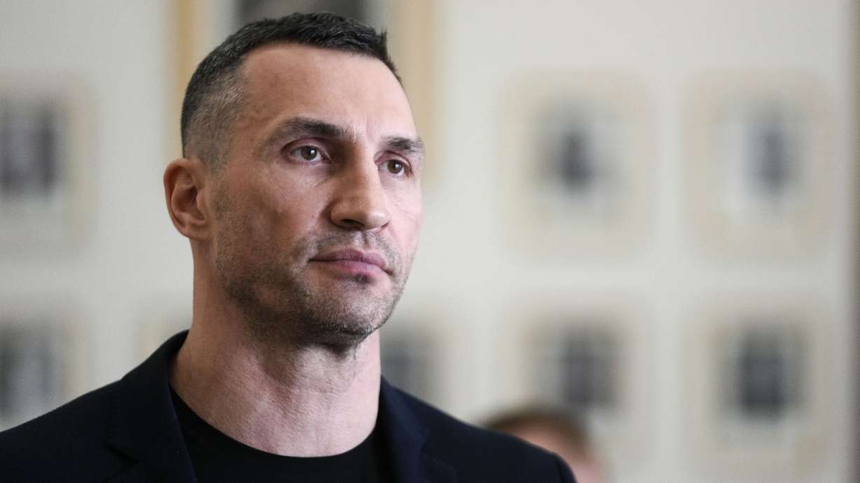 FILE - Former heavyweight boxing world champion Wladimir Klitschko leaves after a meeting with German Economy and Climate Minister Robert Habeck in Berlin, March 31, 2022. Olympic gold medalist Wladimir Klitschko has joined Ukraine’s fight against IOC plans to let some Russians compete at the 2024 Paris Summer Games, it was announced Tuesday, Jan. 31, 2023. The former heavyweight world champion has suggested in a video message sports leaders will be accomplices to the war if athletes from Russia and its military ally Belarus can compete at the next Olympics.
