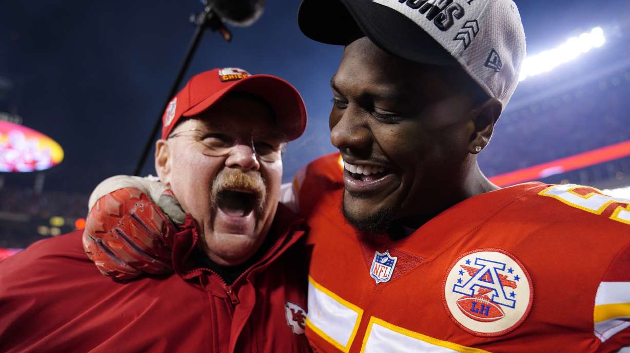 Kansas City Chiefs head coach Andy Reid celebrates with defensive end Frank Clark, right, after the NFL AFC Championship playoff football game against the Cincinnati Bengals, Sunday, Jan. 29, 2023, in Kansas City, Mo. The Chiefs won 23-20.