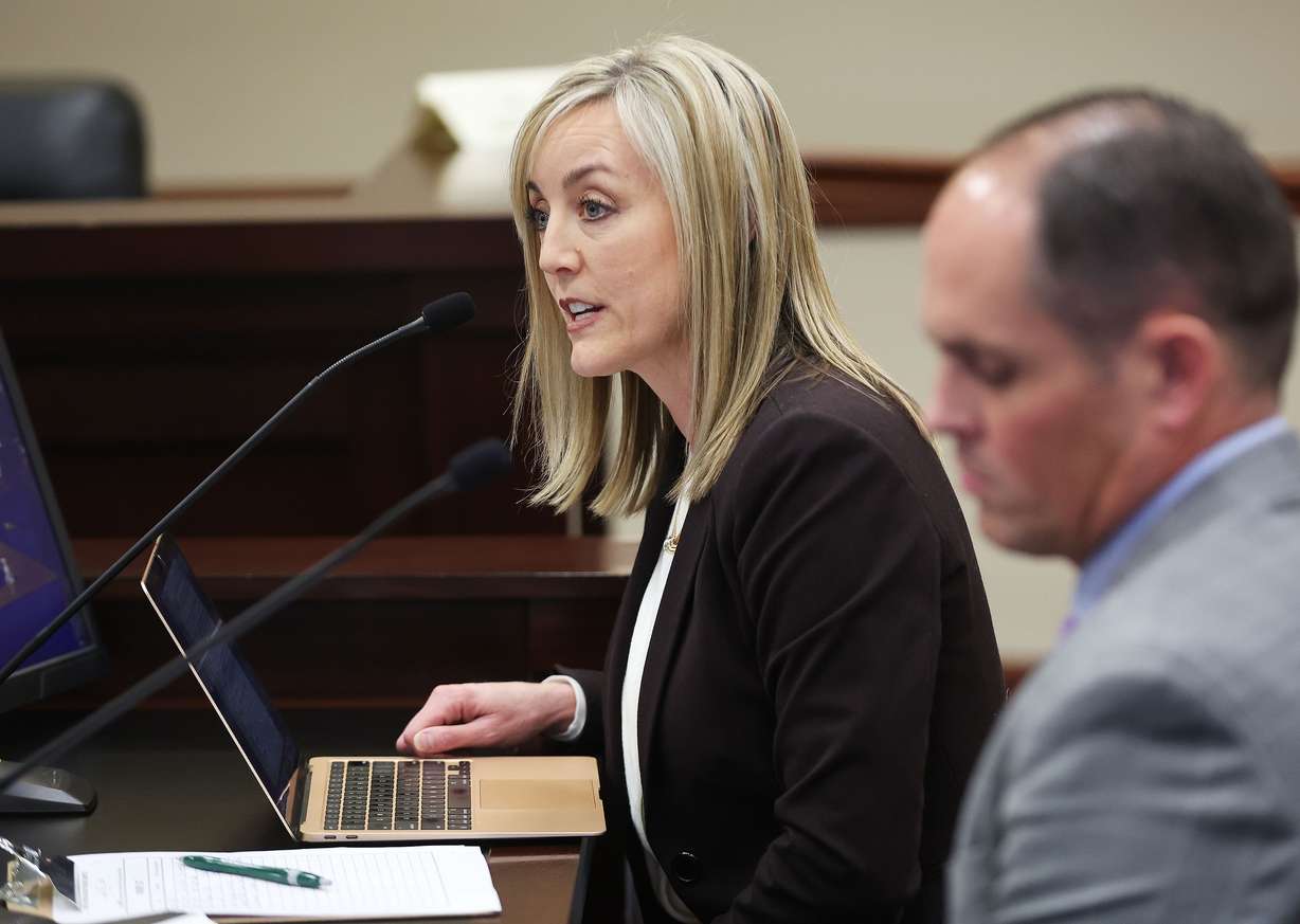 Aimee Winder Newton, senior adviser and director of the new Utah Office of Families, speaks with Sen. Mike McKell, R-Spanish Fork, about social media regulation bill SB152 in the Senate Business and Labor committee meeting at the Capitol in Salt Lake City on Tuesday.