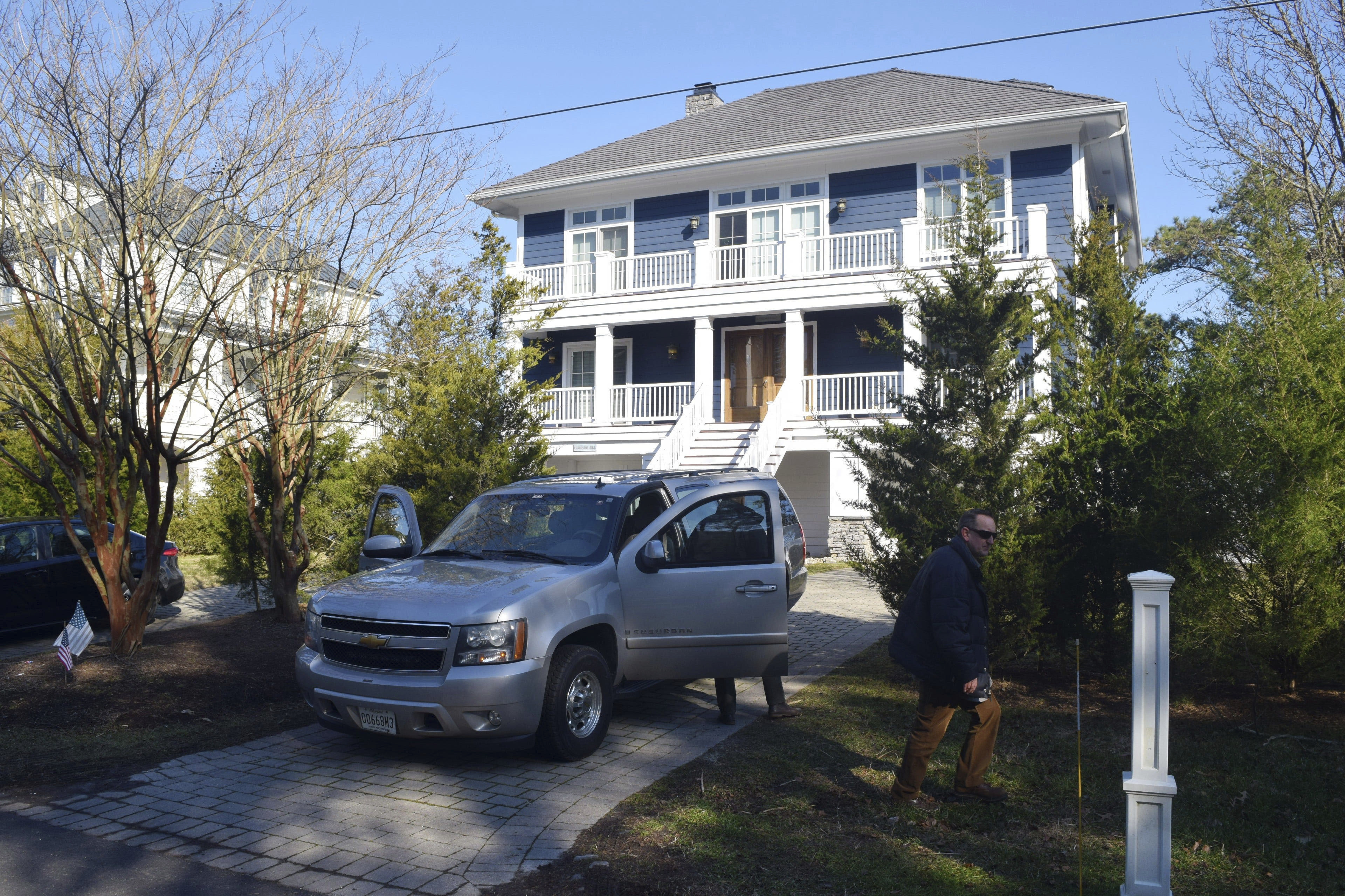 U.S. Secret Service agents are seen in front of Joe Biden's Rehoboth Beach, Del., home on Jan. 12, 2021. The FBI searched Biden’s vacation home in Rehoboth Beach, Delaware, on Wednesday without finding any classified documents, the president’s attorney said.