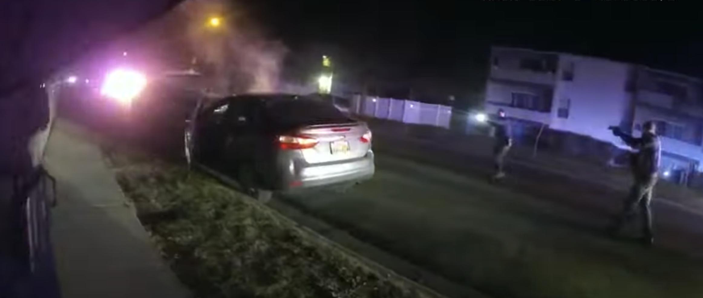Body camera footage from Salt Lake police officers shows officers approaching a car moments before nearby officers at another shot a man who broke into a house in Salt Lake City on Jan. 13, 2022.