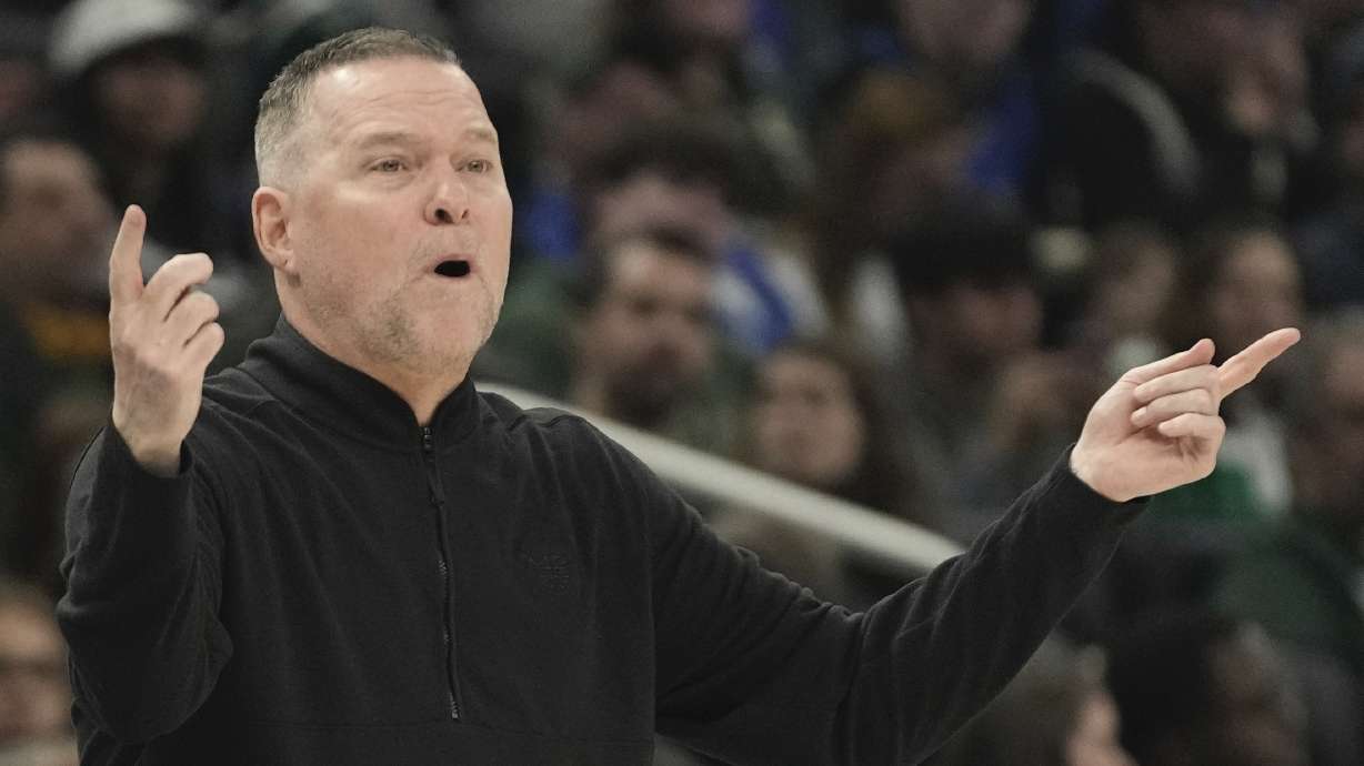 Denver Nuggets head coach Michael Malone reacts during the first half of an NBA basketball game Wednesday, Jan. 25, 2023, in Milwaukee.