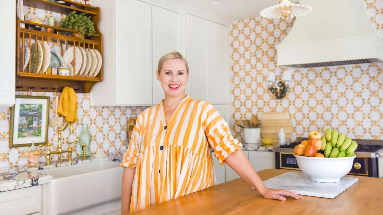Brittany Watson Jepsen stands in her newly renovated kitchen that she designed in homage to Scandinavian heritage she shares with her husband, Paul, and their two kids.