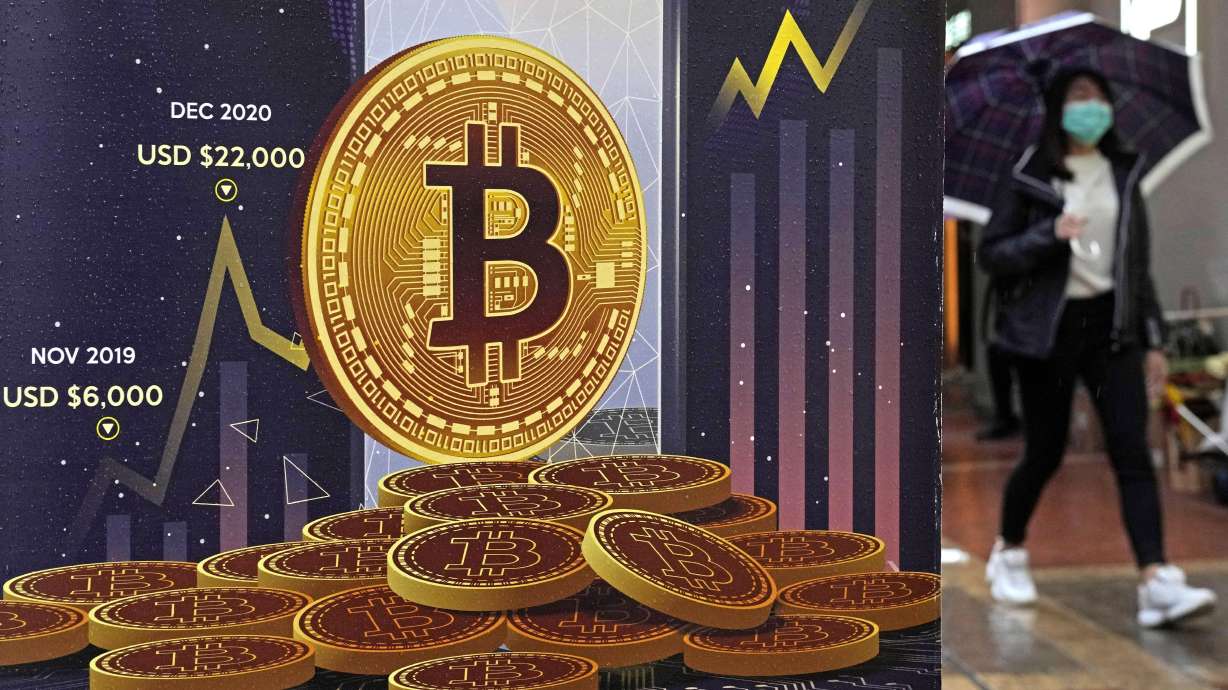 Cyber criminals made off with a record $3.8 billion through hacking attacks on cryptocurrency businesses in 2022, according to a report released Wednesday.