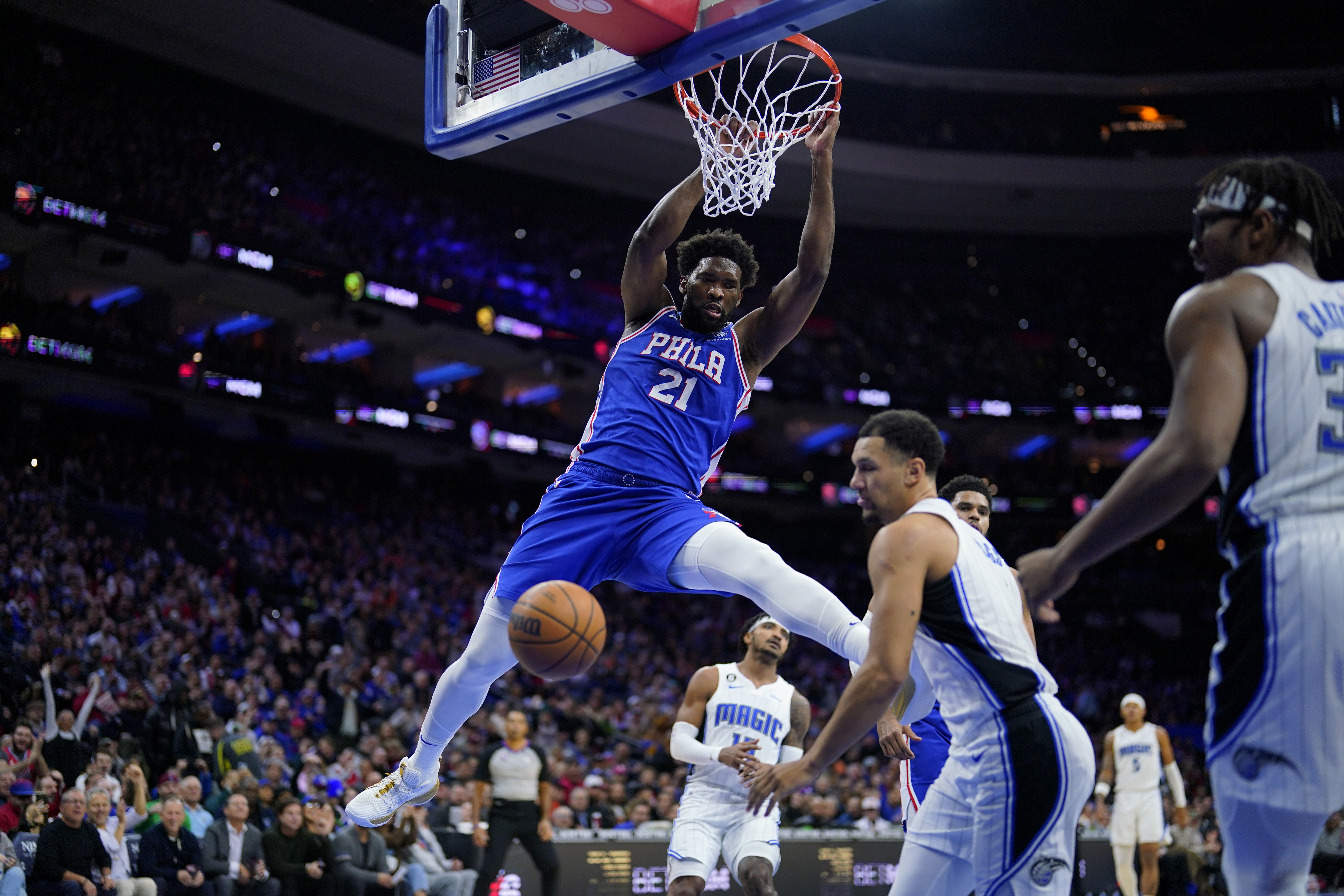 Philadelphia 76ers' Joel Embiid (21) dunks during the first half of an NBA basketball game against the Orlando Magic, Wednesday, Feb. 1, 2023, in Philadelphia. 