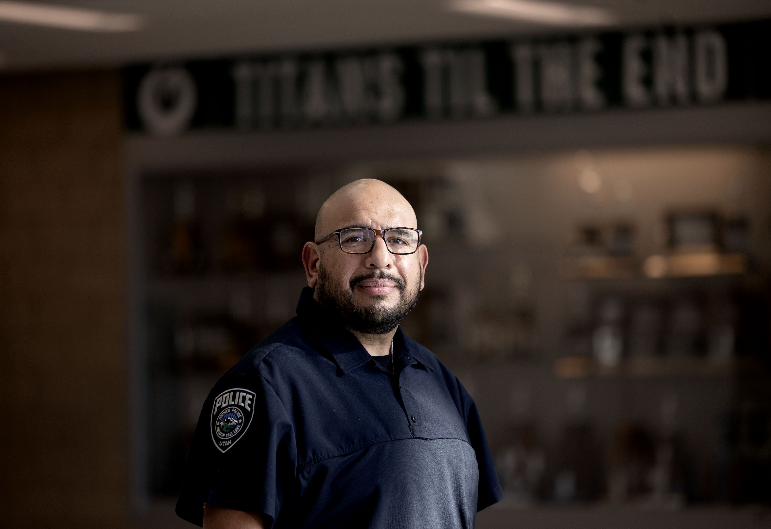 Unified Police SRO Detective Jaime Cardenas is photographed at Olympus High School in Holladay on Thursday. Cardenas has been an SRO, a sworn law enforcement officer responsible for safety and crime prevention in schools, at Olympus High for four years.