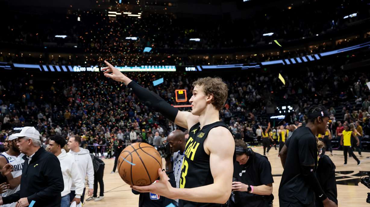 Utah Jazz forward Lauri Markkanen (23) prepares to throw a basketball out to fans after the Jazz beat the Dallas Mavericks at Vivint Arena in Salt Lake City on Saturday, Jan. 28, 2023.