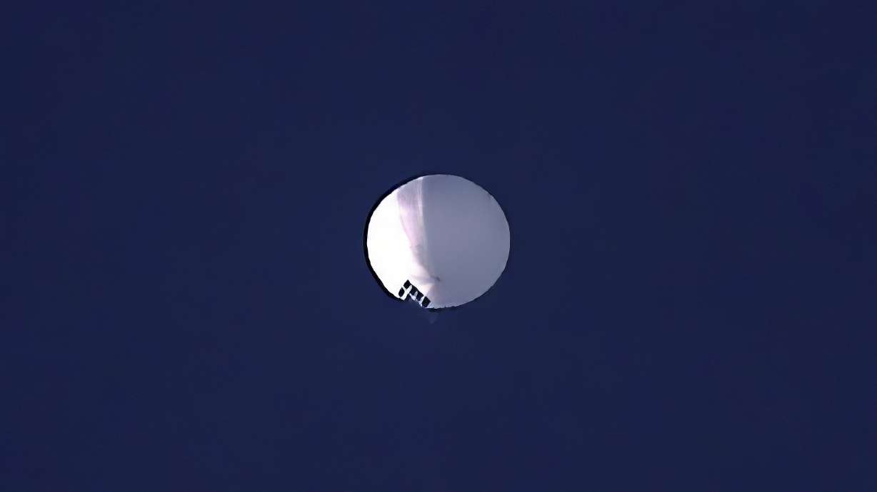 A high-altitude balloon floats over Billings, Mont., on Wednesday. The U.S. is tracking a suspected Chinese surveillance balloon that has been spotted over U.S. airspace for a couple of days.