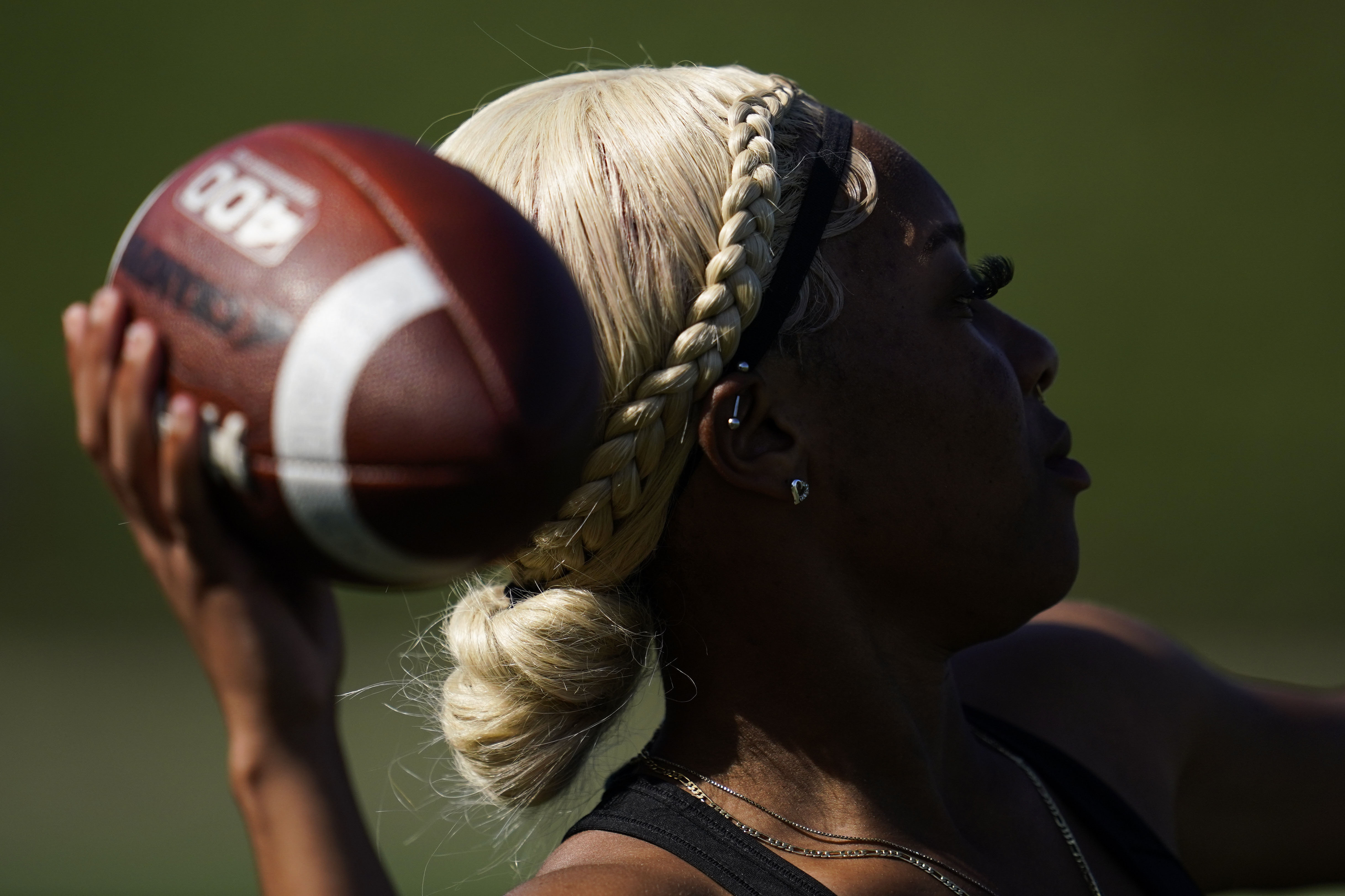 FILE - Sa'Mir Braccey, 17, throws a pass as she tries out for the Redondo Union High School girls flag football team on Thursday, Sept. 1, 2022, in Redondo Beach, Calif. California officials are expected to vote Friday on the proposal to make flag football a girls' high school sport for the 2023-24 school year. 