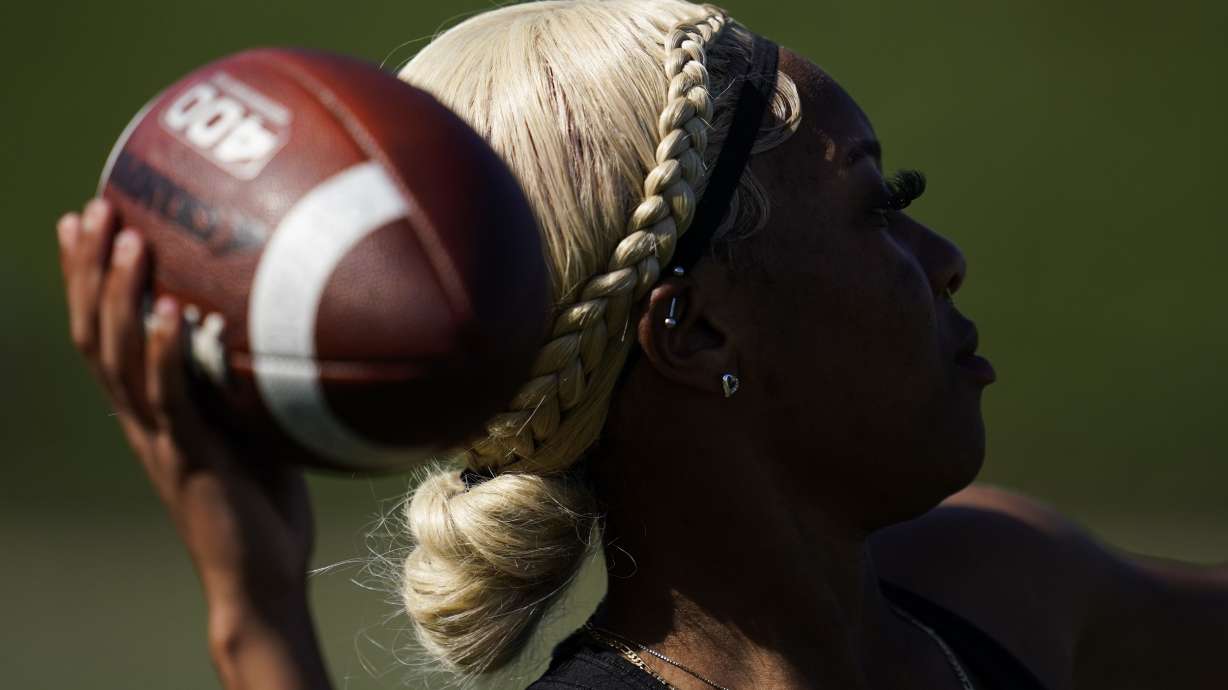 FILE - Sa'Mir Braccey, 17, throws a pass as she tries out for the Redondo Union High School girls flag football team on Thursday, Sept. 1, 2022, in Redondo Beach, Calif. California officials are expected to vote Friday on the proposal to make flag football a girls' high school sport for the 2023-24 school year.