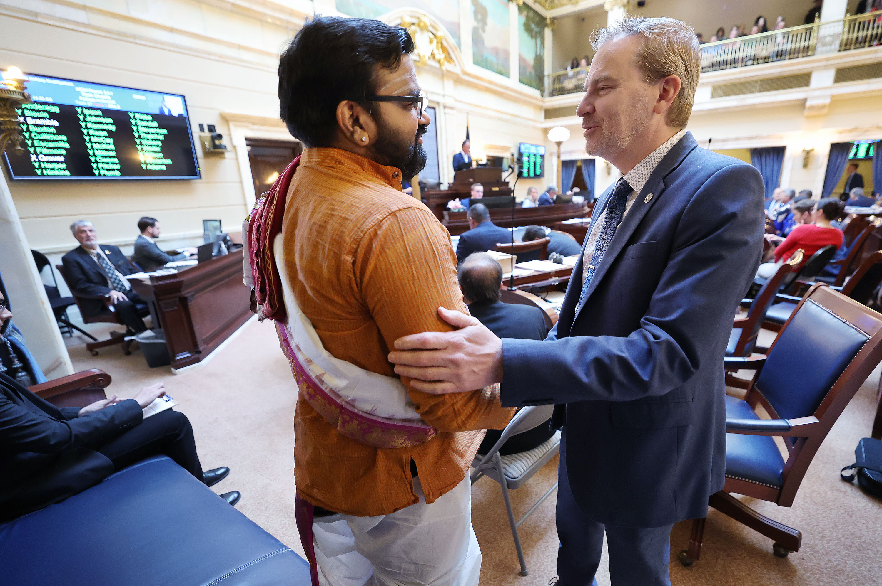 Sen. Lincoln Fillmore, R-South Jordan, talks with Hindu priest Sathish Kumar Niyarthi after speaking about SB46 at the Capitol in Salt Lake City on Friday. SB46 would make Diwali a state commemorative period.