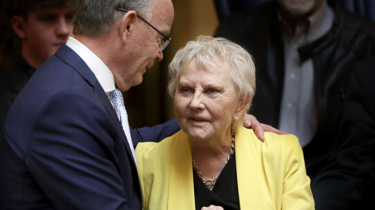 Senate President Stuart Adams, R-Layton, hugs former Sen. Karen Mayne after a bill that creates a scholarship for law enforcement officers passed at the Capitol in Salt Lake City on Friday, Feb. 3, 2023. The scholarship is named after Mayne, who retired earlier this year.