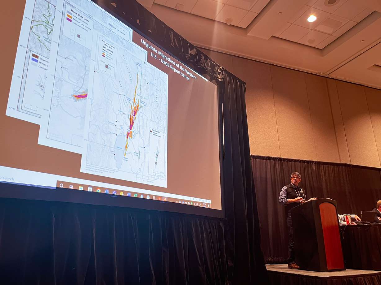 Matthew Kauffman, a wildlife researcher for the U.S. Geological Survey, presents big game animal mapping data in Utah and other Western states during Mule Deer Foundation's Western Big Game Migration Forum meeting at the Western Hunting and Conservation Expo in Salt Lake City Friday afternoon.