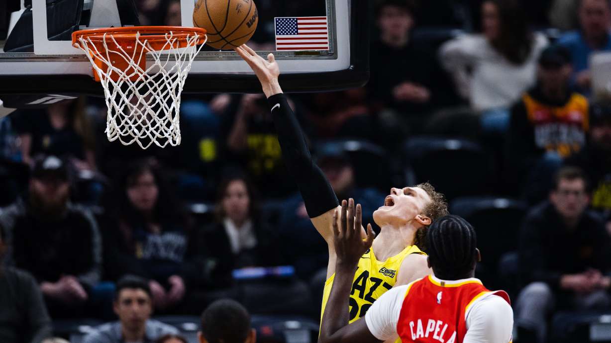 Utah Jazz forward Lauri Markkanen (23) lays the ball up during an NBA basketball game at Vivint Arena in Salt Lake City on Friday, Feb. 3, 2023.