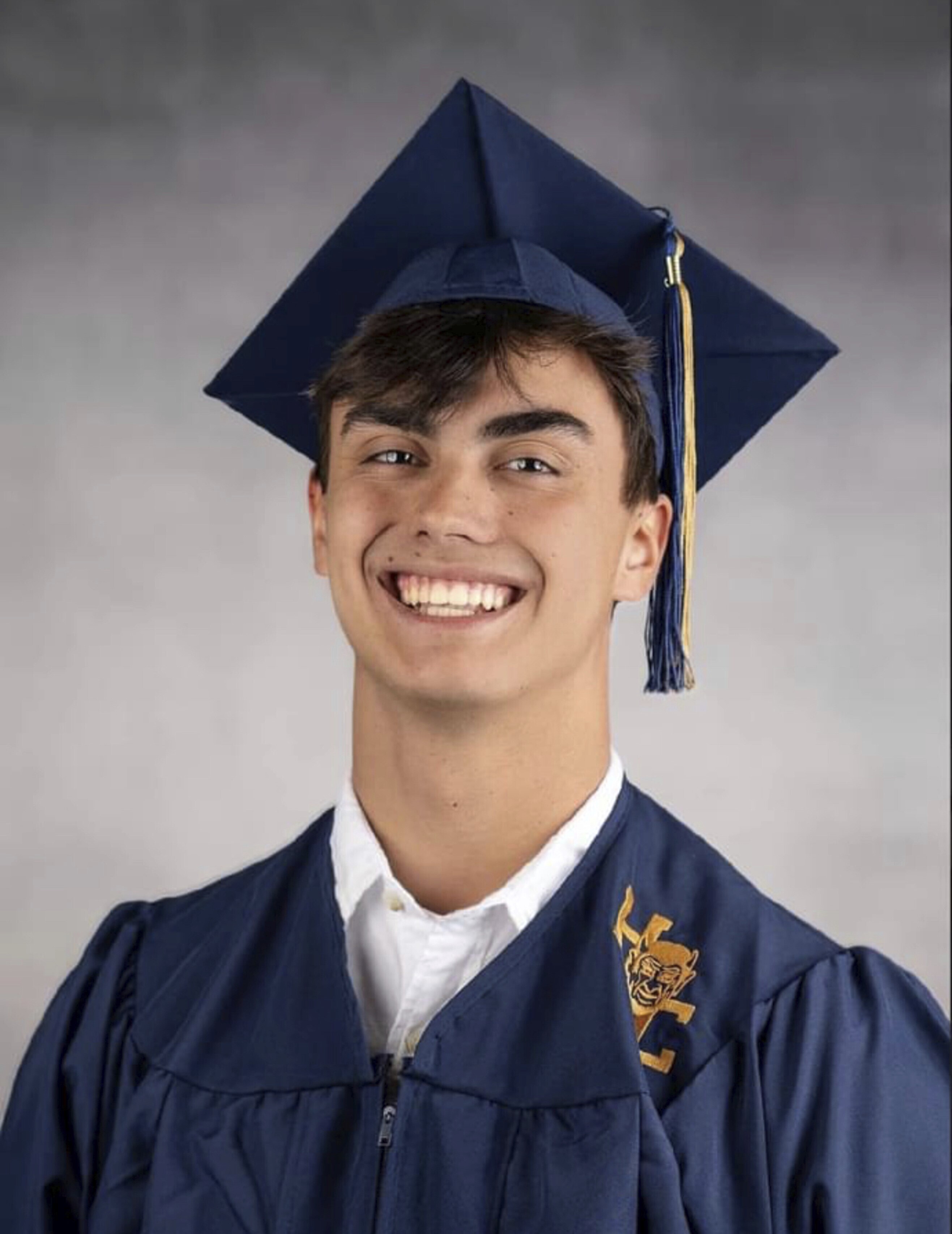 This photo provided by Evergreen Creative Company of Dothan, Alabama, is the senior photo of Tyler Erickson, a 17-year-old from Bonifay, Florida, who died unexpectedly in September 2022. Anti-vaccine activists have falsely suggested that Erickson’s death was related to the COVID-19 vaccine, even though he did not receive that immunization.