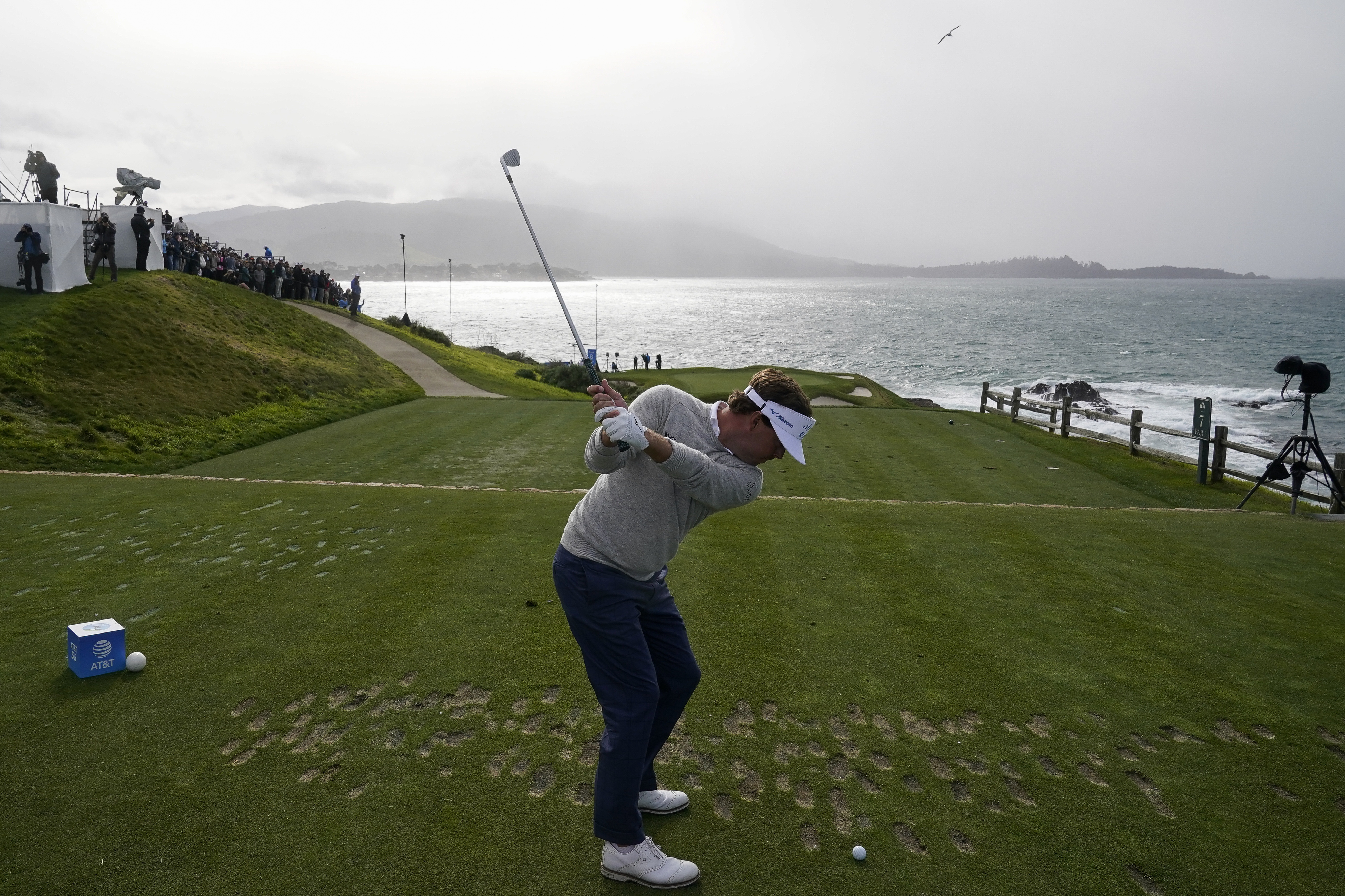 Keith Mitchell prepares to hit a drive on the 7th tee of the Pebble Beach Golf Links during the third round of the AT&T Pebble Beach Pro-Am golf tournament in Pebble Beach, Calif., Saturday, Feb. 4, 2023. 