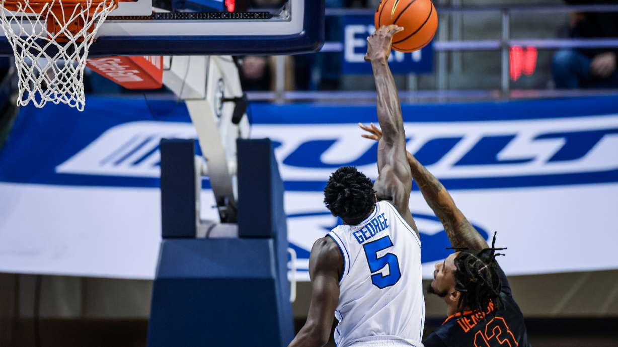BYU wing Gideon George blocks a shot during the Cougars' 81-66 win over Pacific, Saturday, Feb. 4, 2023 in the Marriott Center in Provo.