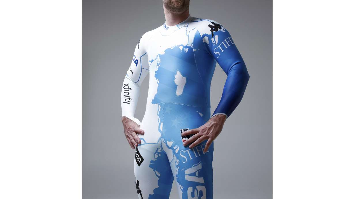 In this undated photo provided by Kappa U.S. ski racer Travis Ganong wears the new race suit to be worn at the world ski championships in France. U.S. Ski & Snowboard, in collaboration with Kappa and Protect Our Winters, designed the suit to help elevate climate change as a priority in snow sports.