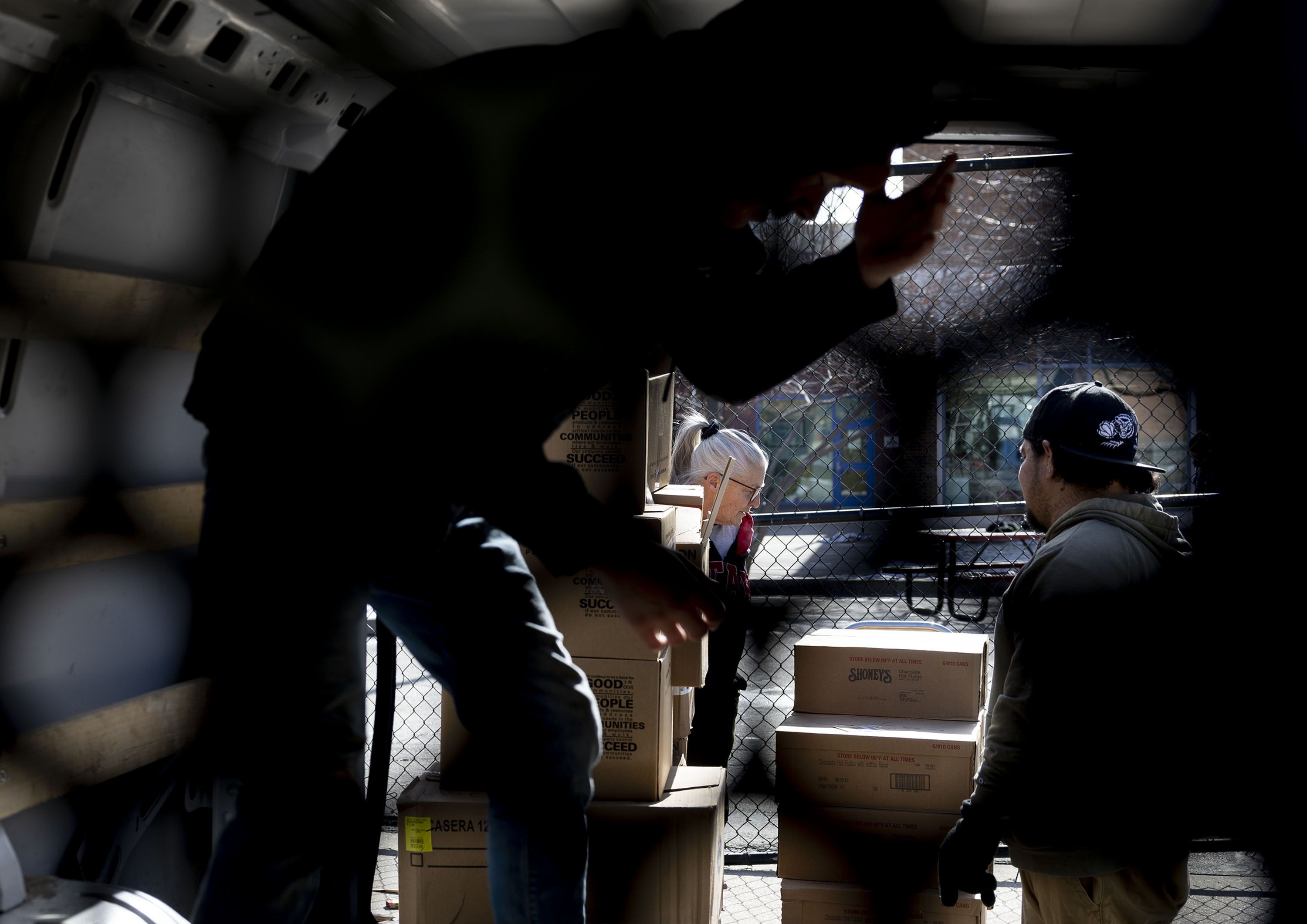 Shauna Devenport picks up donated food items from Catholic Community Services in Salt Lake City on Jan. 30.