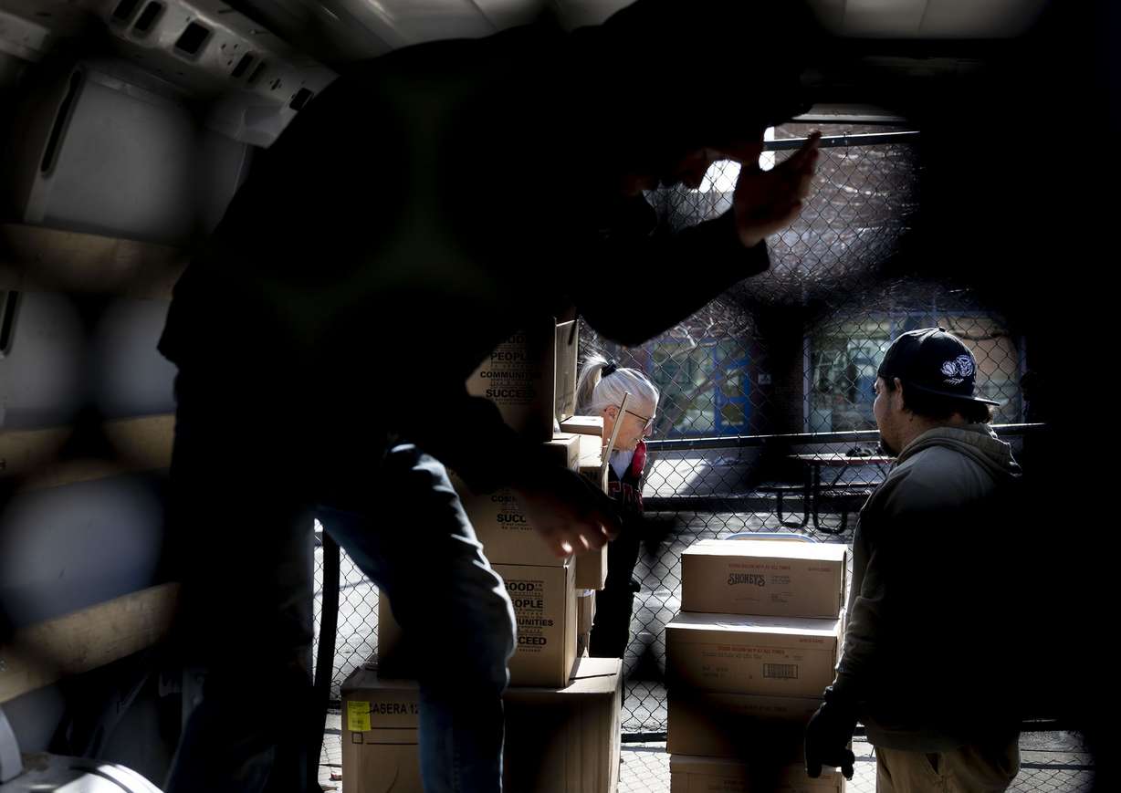 Shauna Devenport picks up donated food items from Catholic Community Services in Salt Lake City on Jan. 30.