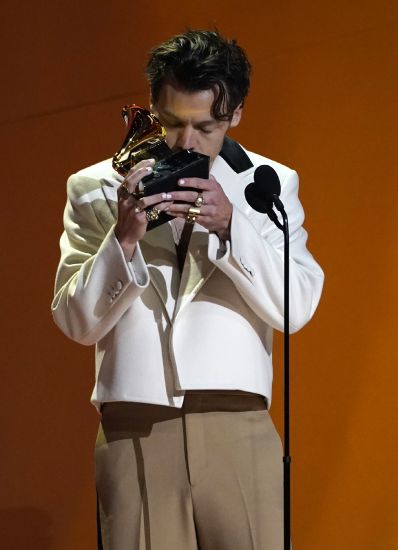 Harry Styles accepts the award for best pop vocal album for "Harry's House" at the 65th annual Grammy Awards on Sunday in Los Angeles.