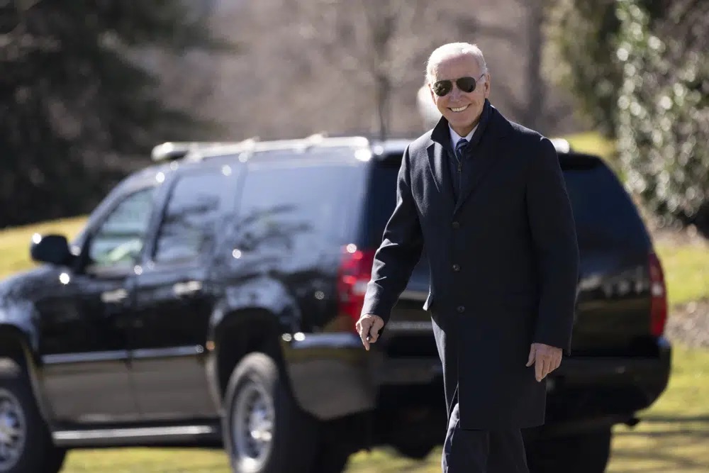 President Joe Biden smiles as he walks on the South Lawn of the White House, Feb. 3, in Washington. A new poll looks at how his favorability for reelection in 2024.