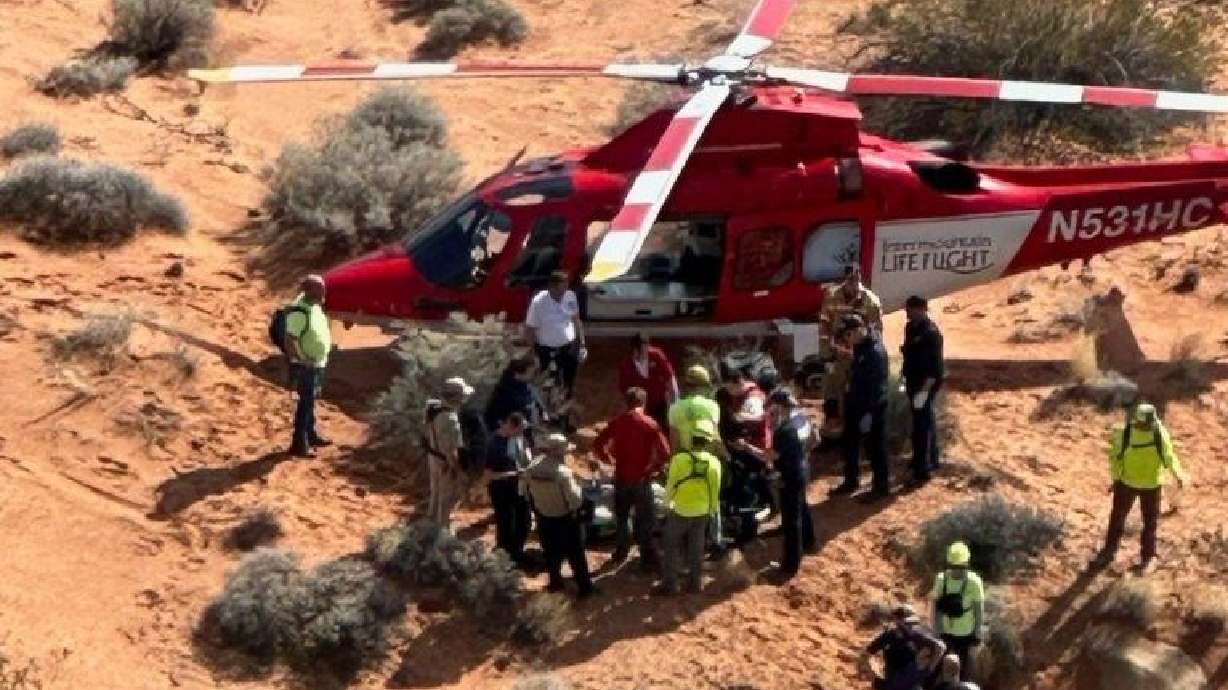 Emergency responders assist in the rescue of a fallen motorcyclist on Saturday morning in St. George.