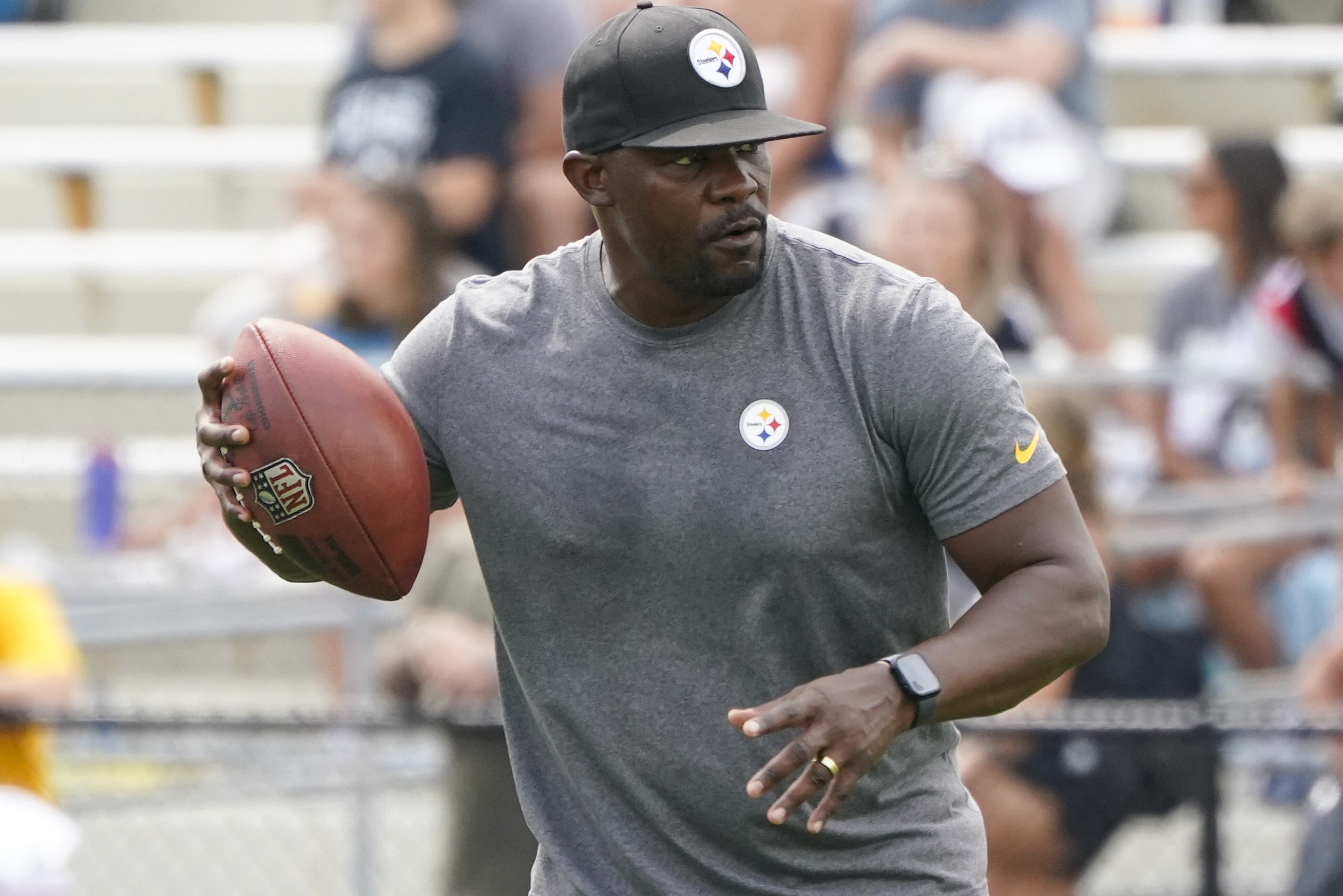 FILE - Pittsburgh Steelers senior defensive assistant Brian Flores works with the defense as they go through drills during practice at NFL football training camp in Latrobe, Pa., Monday, Aug. 8, 2022. Flores, who joined coach Mike Tomlin's staff in Pittsburgh following his messy departure with Miami, is interviewing with the Cleveland Browns on Thursday, Jan. 12, 2023, to be their new defensive coordinator.