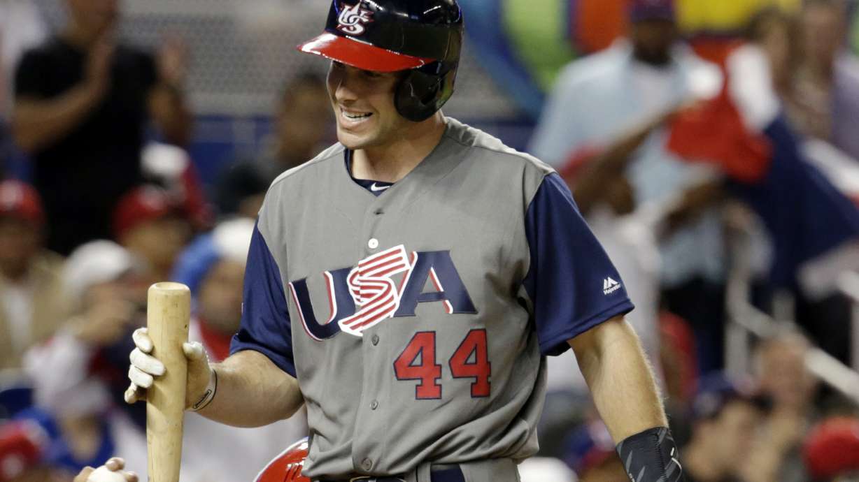 FILE - United States' Paul Goldschmidt walks off after striking out during a first-round game of the World Baseball Classic against the Dominican Republic, on March 11, 2017, in Miami. Major League Baseball’s new pitch clock, limits on shifts and larger bases will not be used during the World Baseball Classic. The three innovations will be debuted during the spring training exhibition season that starts Feb. 24. The 20-team national team tournament runs from March 8-21, and players will return to their clubs for more exhibition games with the new rules ahead of opening day on March 30. (AP Photo/Lynne Sladky, File0