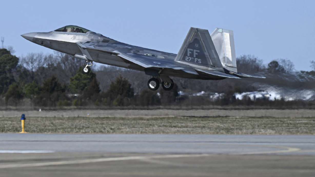 This photo provided by the U.S. Air Force shows a U.S. Air Force pilot taking off in an F-22 Raptor at Joint Base Langley-Eustis, Va., Saturday. At the direction of President Joe Biden, military aircraft brought down a high-altitude surveillance balloon off the coast of South Carolina.