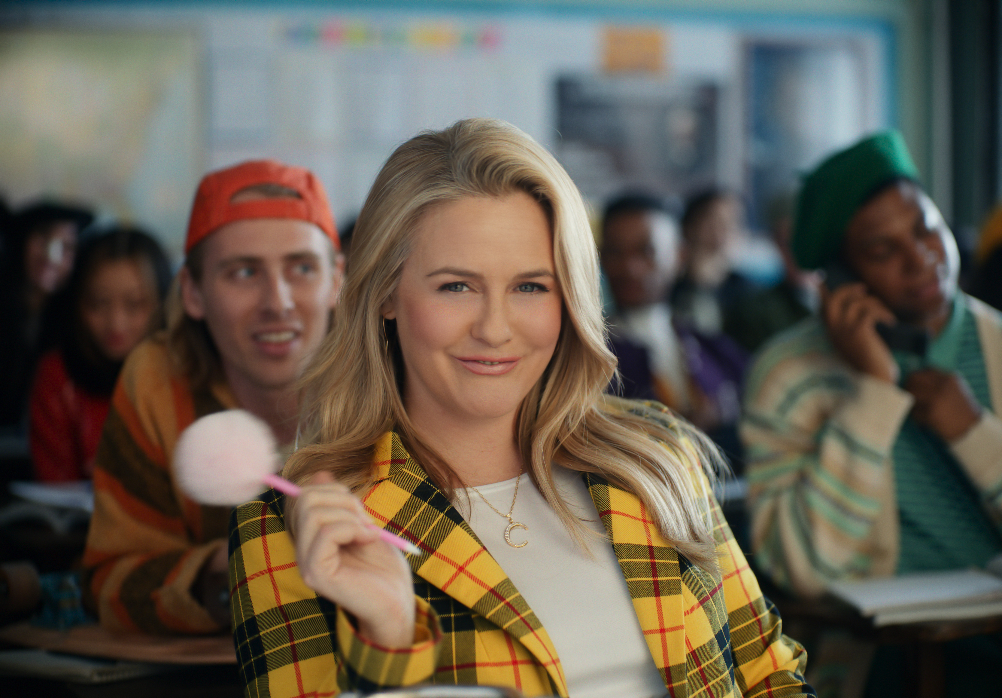 This photo provided by Rakuten Rewards shows Alicia Silverstone in a scene from Rakuten Rewards 2023 Super Bowl NFL football spot. Big name advertisers are paying as much as $7 million for a 30-second spot during the big game on Sunday, Feb. 12, 2023. In order to get as much as a return on investment for those million, most advertisers release their ads in the days ahead of the big game to get the most publicity for their spots. 