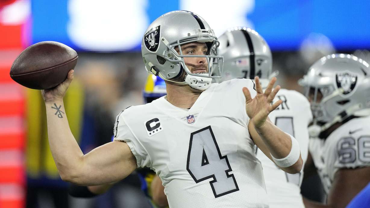 FILE - Las Vegas Raiders quarterback Derek Carr throws a pass during the first half of an NFL football game against the Los Angeles Rams, Dec. 8, 2022, in Inglewood, Calif. Carr said he will not extend the Feb. 15, 2023, deadline to help facilitate a trade from the Raiders.